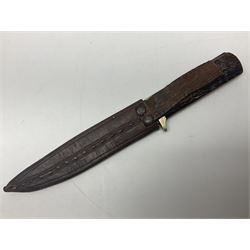 WW2 fighting knife, the 13cm blade by Priestman of Sheffield marked with scout and camp fire motif; two piece antler grip; in leather sheath crudely marked R.T. with a broad arrow L23cm overall Auctioneers Note: By family descent this knife was reputedly presented to Richard Towse during WW2 for guarding a group of POWs.