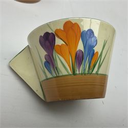 Clarice Cliff for Newport Pottery ceramics, comprising preserve jar and Bon Jour shape teacup, both in Crocus pattern, together with a Clarice Cliff for Wilkinson Ltd, preserve jar with cover, in Gayday pattern, preserve jar H10cm