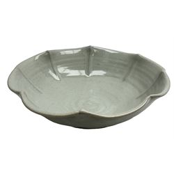 Jeremy Leach (British 1941-): Celadon glazed stoneware bowl of fluted circular form, with impressed mark beneath, D35cm