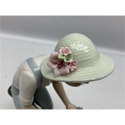 Lladro figure, The Flower Peddler, modelled as boy with a cart of flowers, no 5029, sculpted by Francisco Catala, year issued 1980, year retired 1985, H26cm
