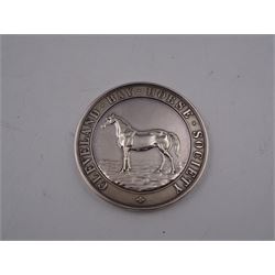 Edwardian silver medal, of circular form, embossed to front with a bay horse and inscribed Cleveland Bay Horse Society, engraved verso 1904 Egton Show won by Rock Dove No 1000 bred at Rock Head by W Duell, hallmarked Vaughton & Sons, Birmingham 1903, contained within fitted case, D6.3cm