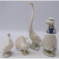  Four Nao figures tall Swan (no. 52) boxed, 'Optimistic duck' boxed, Girl with Dog & a Dove, H33cm max  
