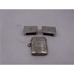 Pair of early 20th century silver matchbox covers, each of typical form, engraved with a tree to the centre, with personal engraving to reverse, hallmarked Stokes & Ireland Ltd, Chester, date letter worn and indistinct, together with a late Victorian silver vesta case, engraved with floral decoration, with monogrammed shield shaped cartouche to centre, hallmarked E V Pledge & Son, Birmingham 1900