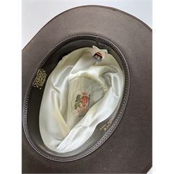 Akubra pure fur felt trilby hat, together with another trilby and two top hats, one by Woodrow and one by Dunn & Co