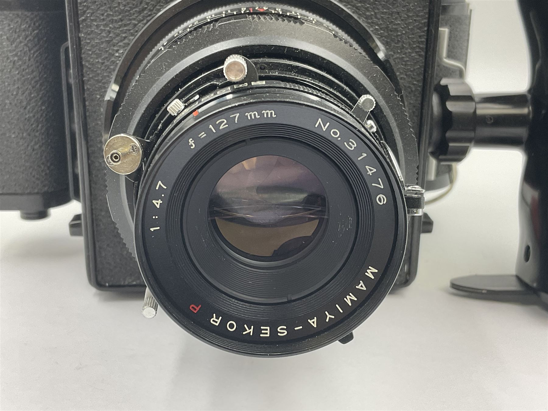 Mamiya Universal camera body, serial no. A87210, with 'Mamiya - Sekor P 1:4.7 f=127mm' lens, serial no. 31476 and Mamiya 6x9 roll film adapter