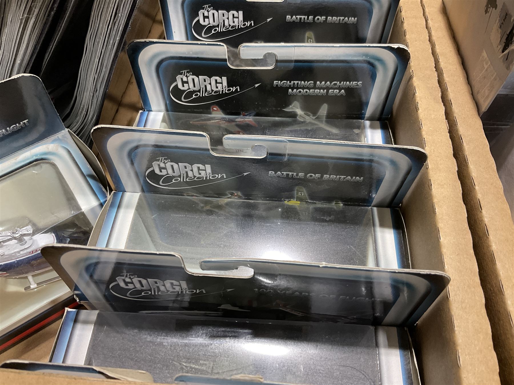 Thirty-six Amer Czechoslovakia periodical issued metal models of helicopters in original packaging; with thirty-nine issues of 'Helicopter Magazine' in two original binders; together with eight Corgi Collection die-cast military models; all boxed; and two others with small display rack; in three boxes