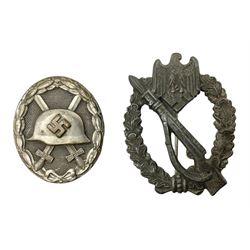WW2 German Infantry Assault Badge, no maker's mark; and WW2 German silvered wound badge, indistinct maker's mark under pin housing (2)