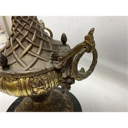 Cast brass table lamp, with lattice and foliate decoration and three loop handles, the marble base upon three bun feet, H71cm