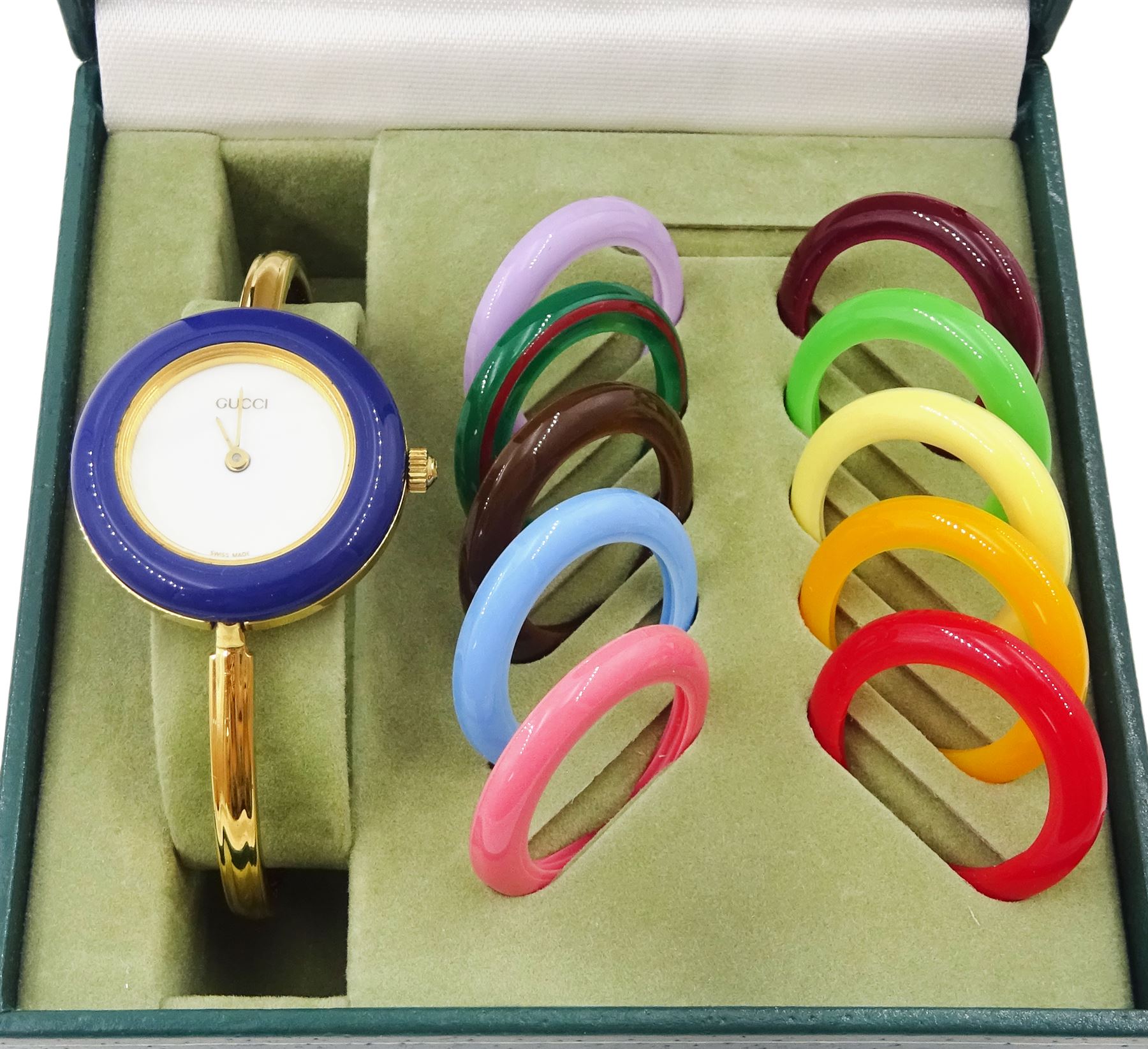 Gucci ladies gold-plated quartz wristwatch, Ref. 11/12.2, with eleven interchangeable coloured ring bezels, boxed with warranty card dated 1997 