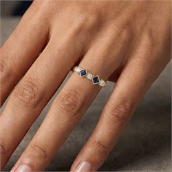 9ct gold sapphire and diamond ring, two square cut sapphires spaced by three round brilliant cut diamonds, hallmarked, total diamond weight approx 0.20 carat