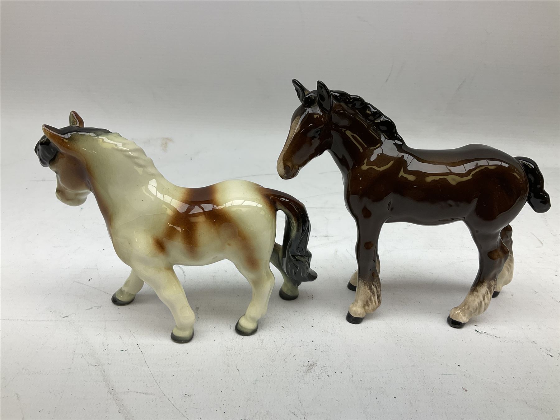 Seven Beswick figures of horses, including Connemara pony in grey no.1641, Arab in bay no.1265, large foal in grey no.947 etc, together with a Goebel figure of a horse (8)