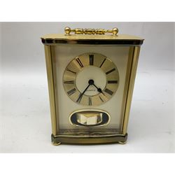 Pure Digital Evoke-1XT DAB digital radio and additional speaker, together with Quartz mantel clock