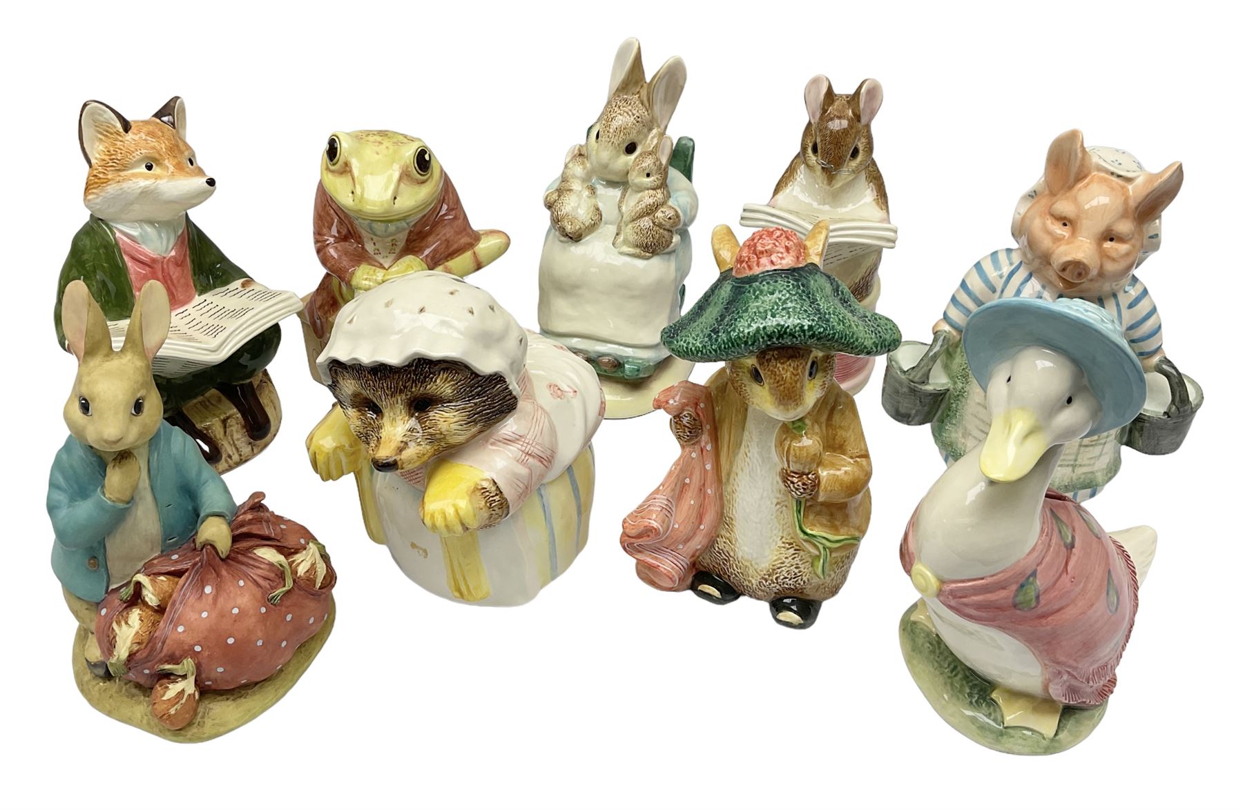 Nine Border Fine Arts and Enesco Beatrix Potter money boxes, to include Peter Rabbit, Benjamin Bunny, Mrs Tiggy-winkle, jemima puddle duck etc  
