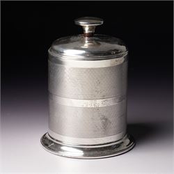 Silver cigarette dispenser with engine turned decoration, Bakelite base and divided interi...