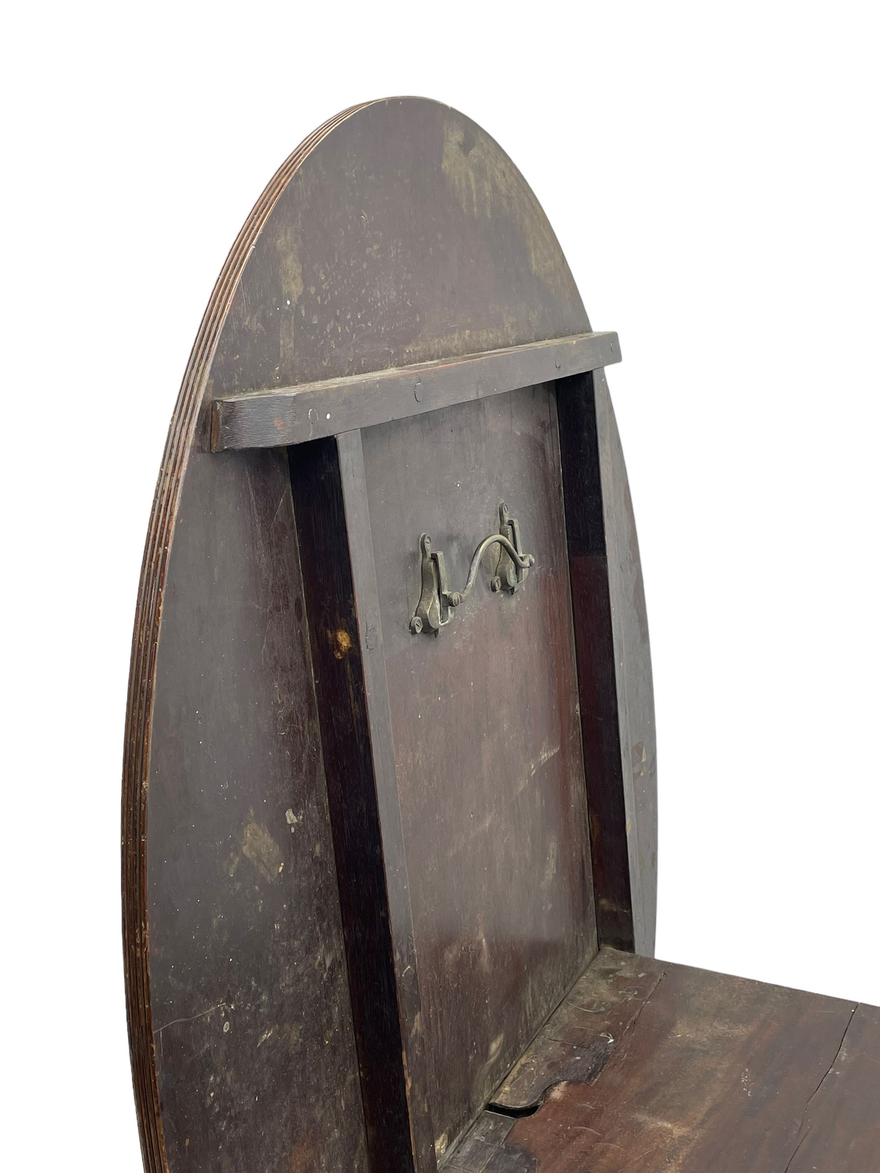 George III mahogany breakfast table, the oval top with a kingwood band and boxwood stringing, raised on a turned vasiform pedestal terminating in a fluted sabre tripod base with hairy paw feet and castors