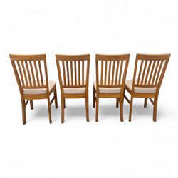 Contemporary solid oak rectangular dining table, with two additional extension leaves, together with eight matching high back dining chairs upholstered in cream suede-effect fabric (9) (Chair H 95cm, W 41cm, D 53cm) (Extends to 270cm)