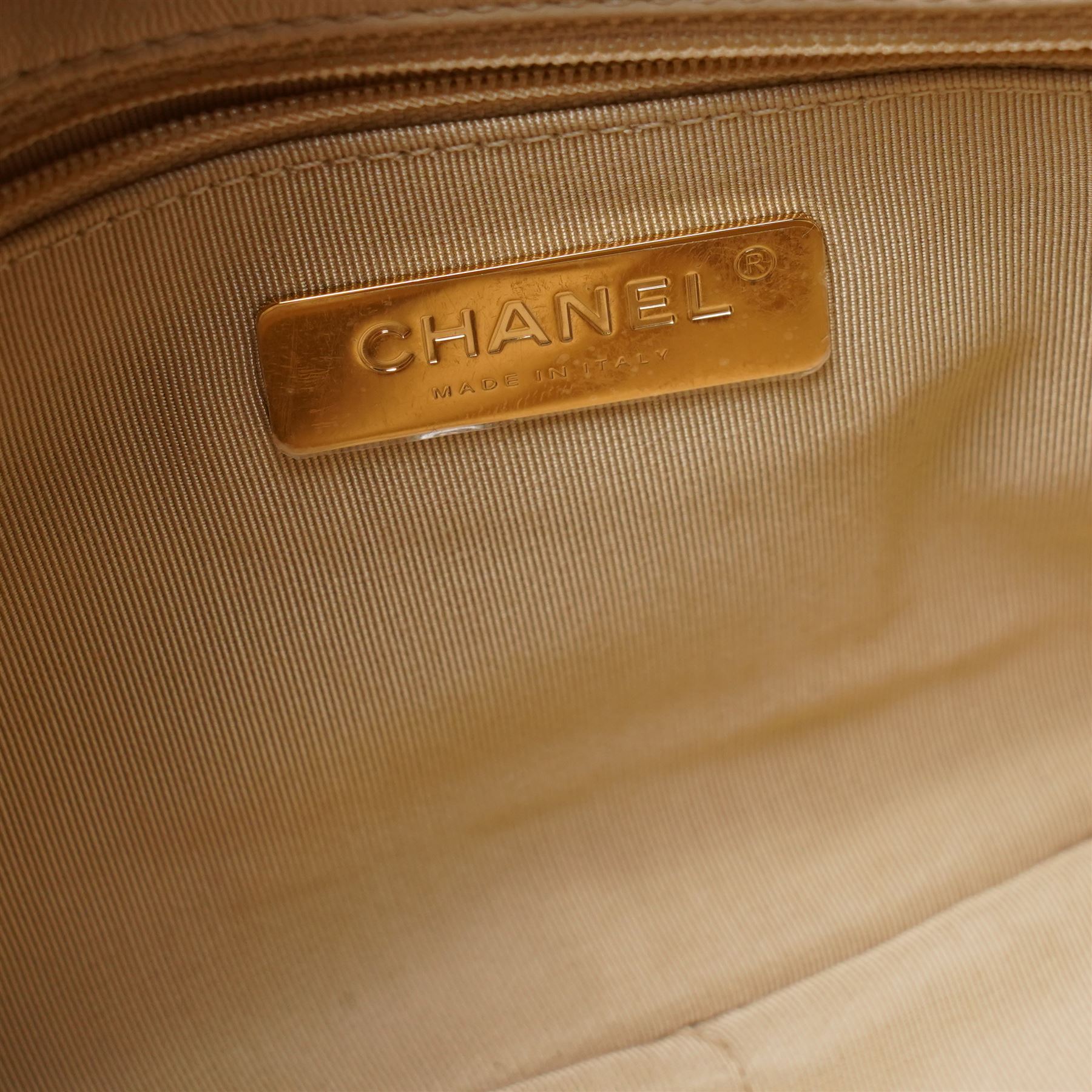 Chanel - ‘19’ Medium Flap Bag, the model introduced in 2019 as one of the final designs associated with Karl Lagerfeld, in cream quilted lambskin leather with mixed gold, silver and ruthenium-tone chain strap and signature CC monogram turn-lock fastening, unused with original dust bag and box