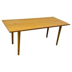 Ikea - Rectangular oak table, slim rectangular top over rounded edges, supported by tapered cylindrical legs  