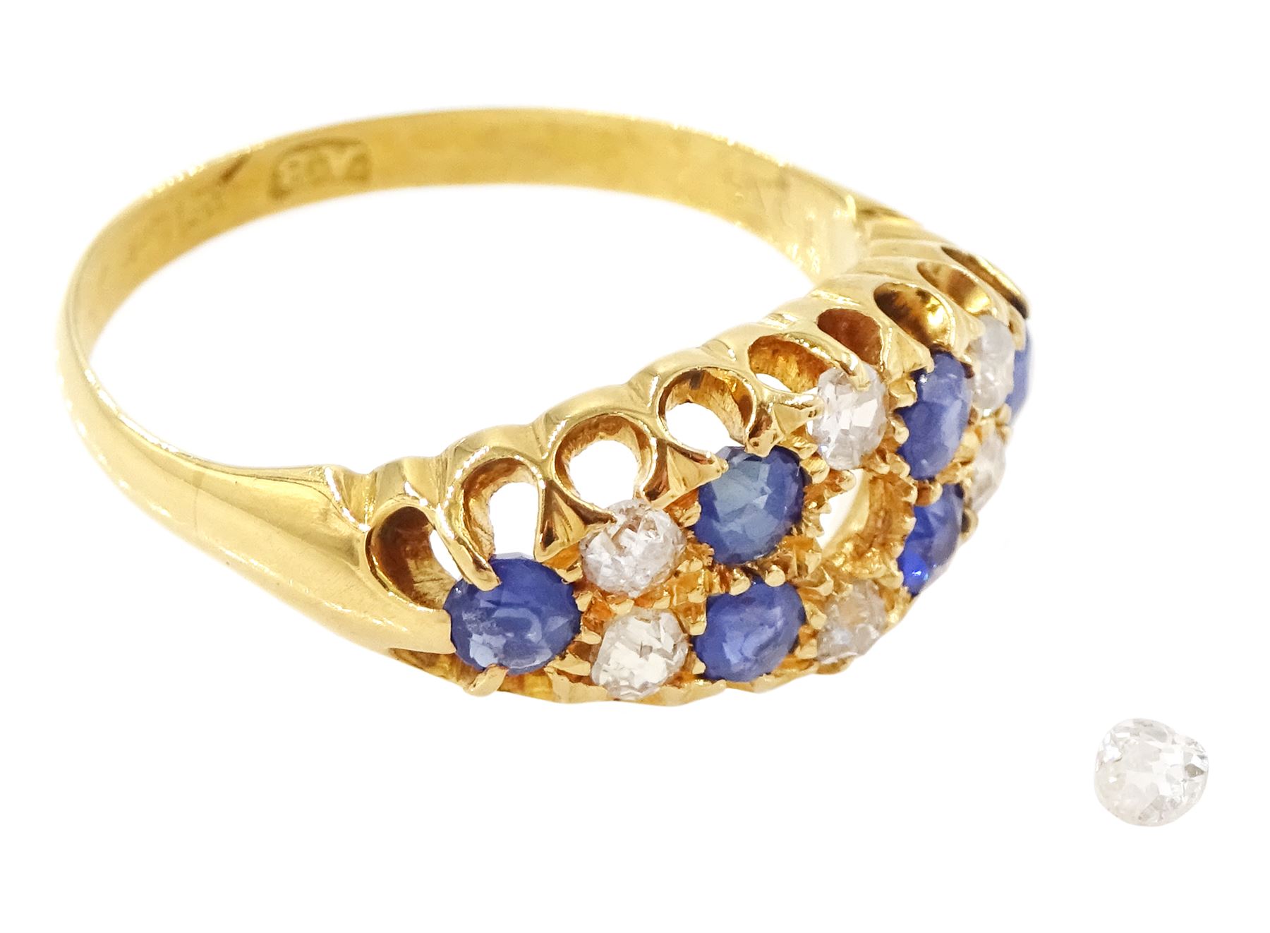 19th / early 20th century 18ct gold diamond and sapphire ring, three rows of old cut diamonds, each spaced by round cut sapphires, total diamond weight approx 0.50 carat