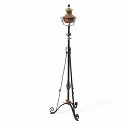 Early 20th century converted oil lamp standard, with copper reservoir and brass burner mou...