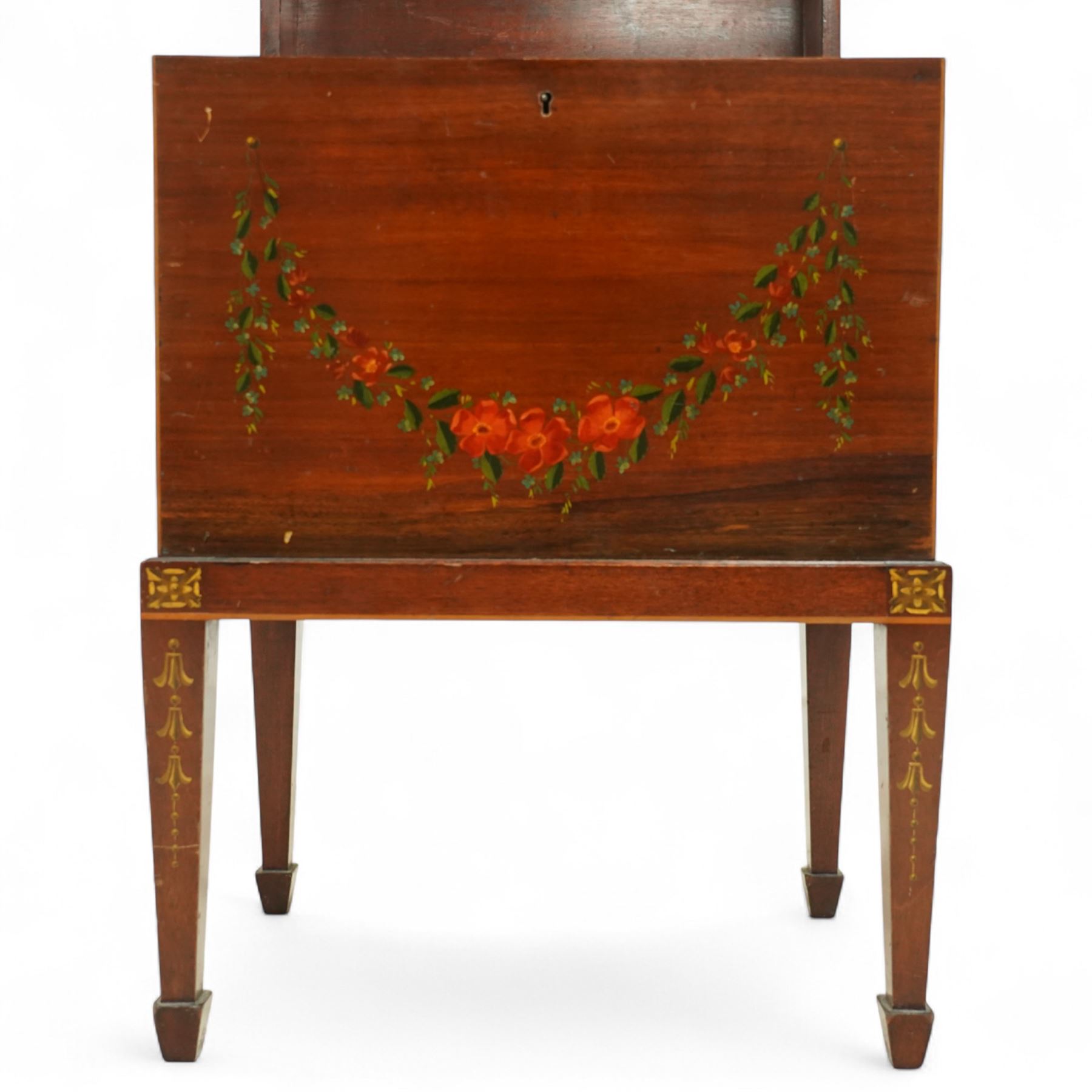 Edwardian painted mahogany and satinwood music cabinet, of rectangular form with domed hinged lid, the front and top decorated with hand-painted floral garlands and a central neoclassical panel depicting cherubs, raised on square tapering legs with gilt highlights