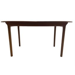 AH McIntosh & Co of Kirkaldy - mid-20th century teak extending dining table, rectangular top with rounded corners, concealed integrated double leaf, raised on tapered supports, 'Furniture by McIntosh sticker to underside of leaf