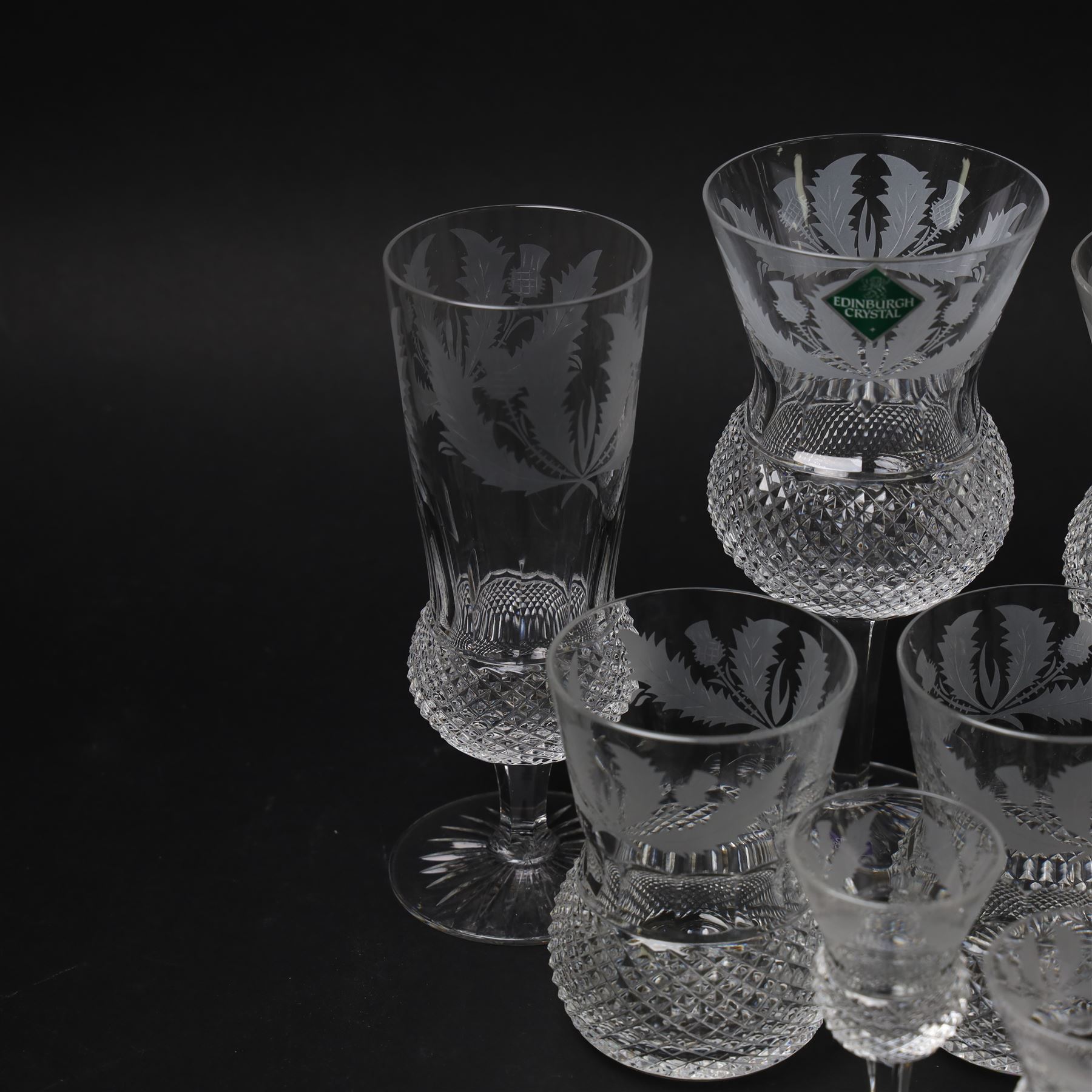 Ten Edinburgh Crystal Thistle pattern glass, comprising one red wine glass, two white wine glass, champagne flute, two port, three sherry and one tumbler