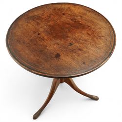 George III mahogany tilt-top tripod table, the circular top with moulded edge and inlaid edge, tilting on an iron catch above a ring-turned column, raised on three outswept legs terminating in pad feet