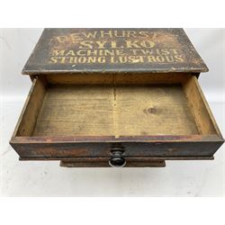 Early 20th Century Dewhurst table top chest, decorated with gilded 'Dewhurst's Sylko Machine Twist Strong Lustrous' lettering above six long drawers with names and numbers of cotton also detailed in gilt, H39cm