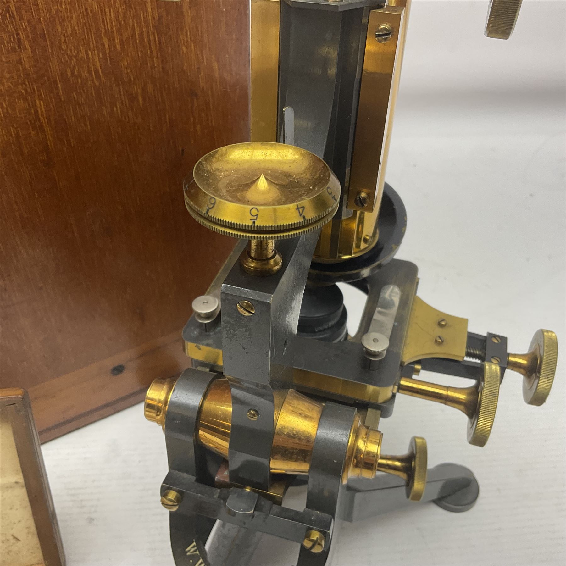 W. Watson & Sons Ltd lacquered brass compound microscope circa 1910, the back foot signed W. Watson & Sons Ltd, 313 High Holborn London and numbered 8193, together with a boxed collection of glass microscope biological sample slides