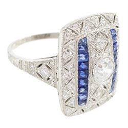 Platinum milgrain set diamond and sapphire ring, the principal old cut diamond of 0.53 carat, with pierced design, single cut diamond and calibre cut sapphire surround, stamped Plat, total sapphire weight 0.30 carat 