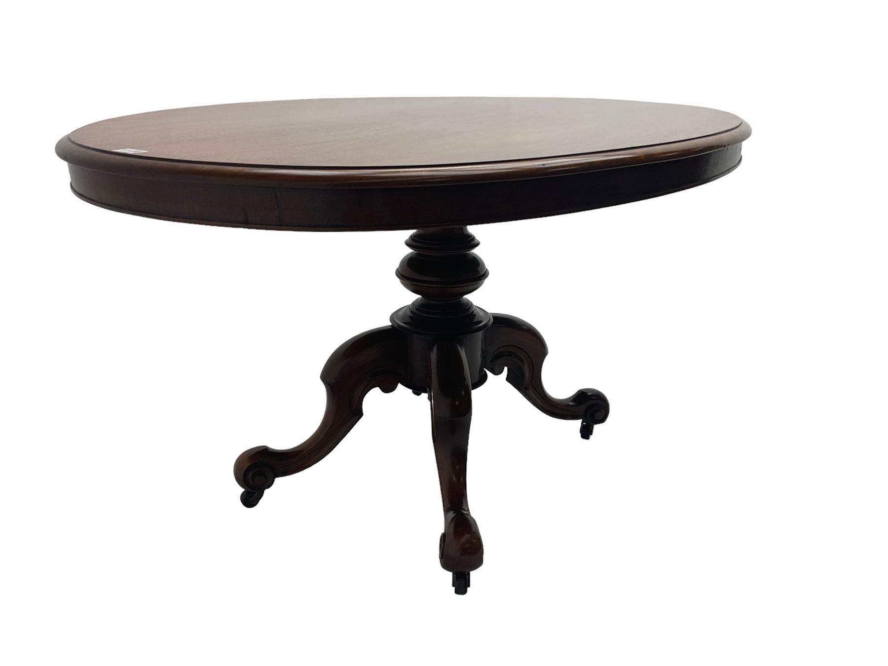 Victorian mahogany oval loo table, moulded edge with banded frieze, raised on baluster turned pedestal with quadrupod base, cabriole supports with scroll feet and castors