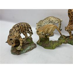 Ten Franklin Mint National wildlife Foundation Big Cats of the World figures to include, White Bengal Tiger, Jaguar, Cougar, Cheetah, Clouded Leopard etc, with display stand
