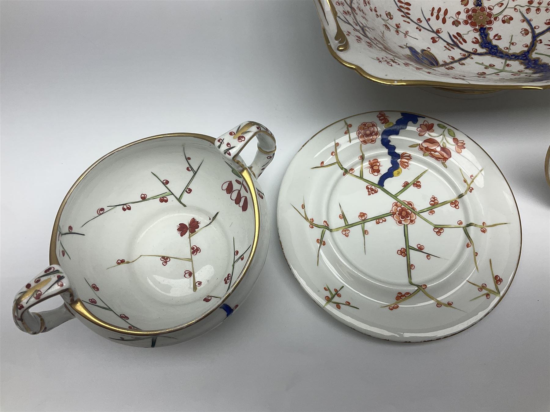 19th century Royal Crown Derby in cherry tree pattern, twin handled sauce dish and saucer and twin handled dish, together with three Royal Crown Derby plates, including one signed WEJ Dean