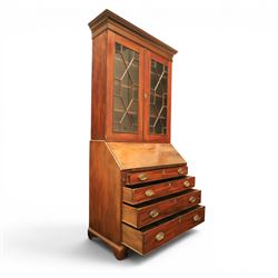 George III mahogany bureau bookcase, with projecting cornice top with dentil detail, astragal glazed cabinet enclosing fixed shelves, the lower section with fall front writing surface, fitted interior above four graduated drawers, raised on bracket feet