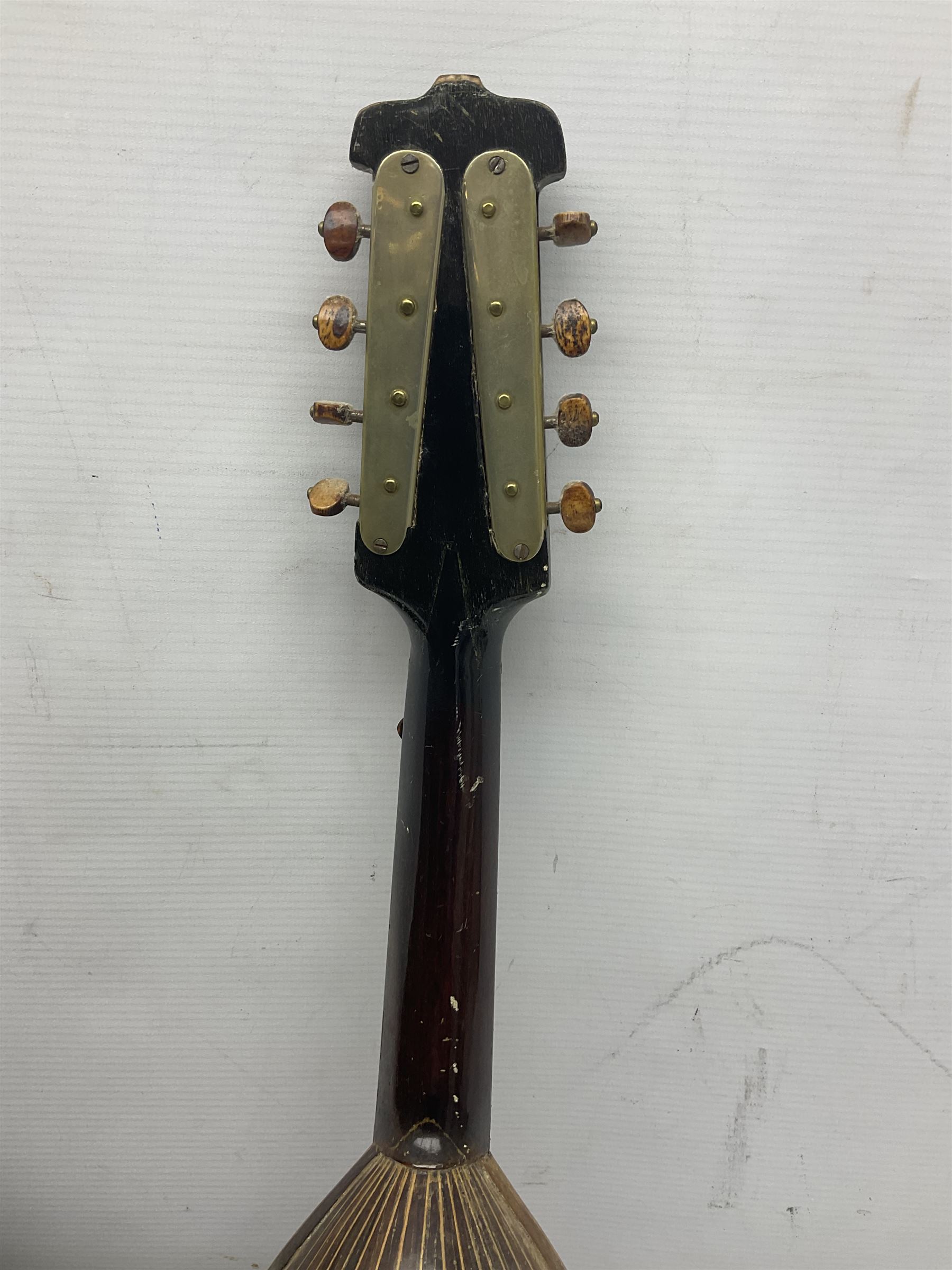 Italian bouzouki type long necked mandolin with segmented lute back and spruce top with tortoiseshell style panels; bears label 'Miroglio & Figli Sicilia Catania Italia' L99cm; and Italian lute back mandolin with segmented back and spruce top bearing label for F. De Mureda Napoli (2)