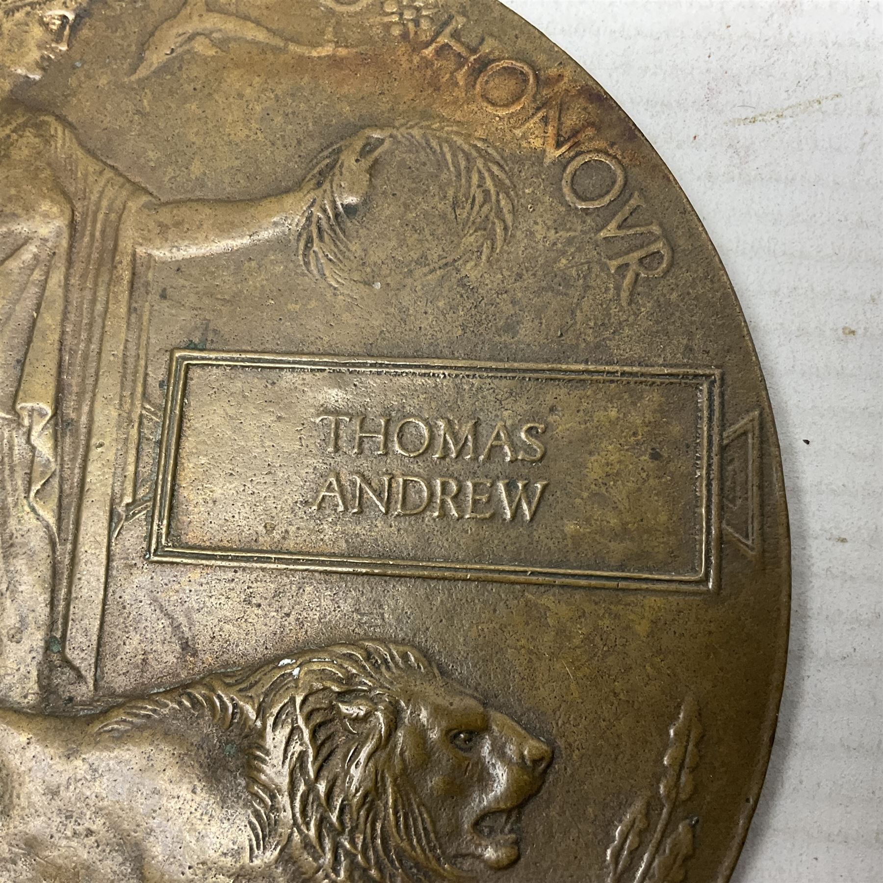 WWI group of three medals with bronze memorial plaque comprising 1914-15 Star, British War Medal and Victory Medal awarded to 16554 Pte. T. Andrew Linc. R. who died on 26th July 1916 whilst travelling to Vimy Ridge, polished and mounted for display in a frame; together with small archive of research material and two WWII V.E. Day Presentation Certificates from the people of Holbeach in Lincolnshire