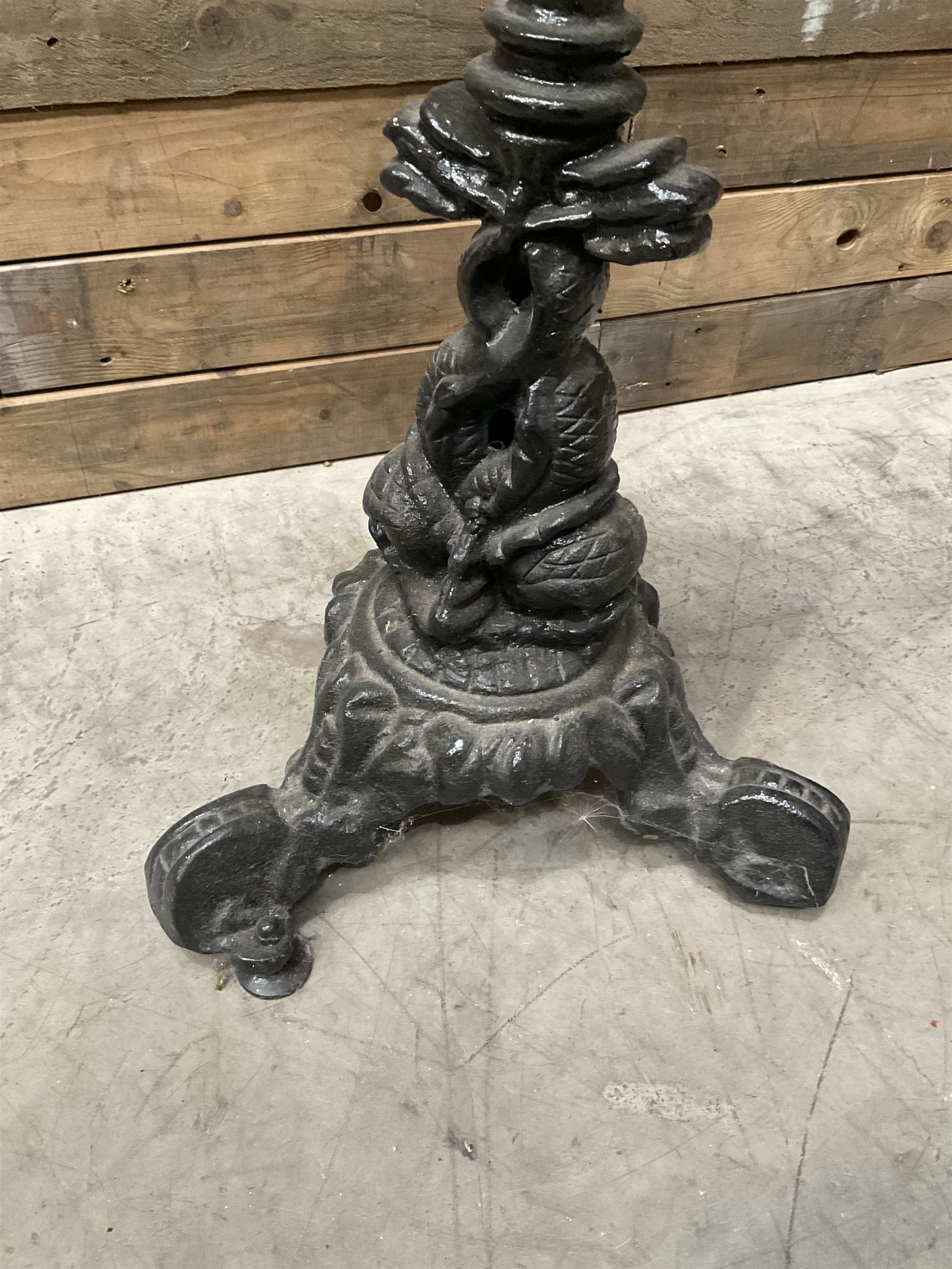 Cast iron Britannia circular pub table, and two pedestal cast iron bases (3)