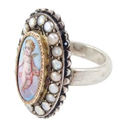 19th century French silver enamel portrait ring, set with an oval hand painted panel of a cherub, with split pearl surround