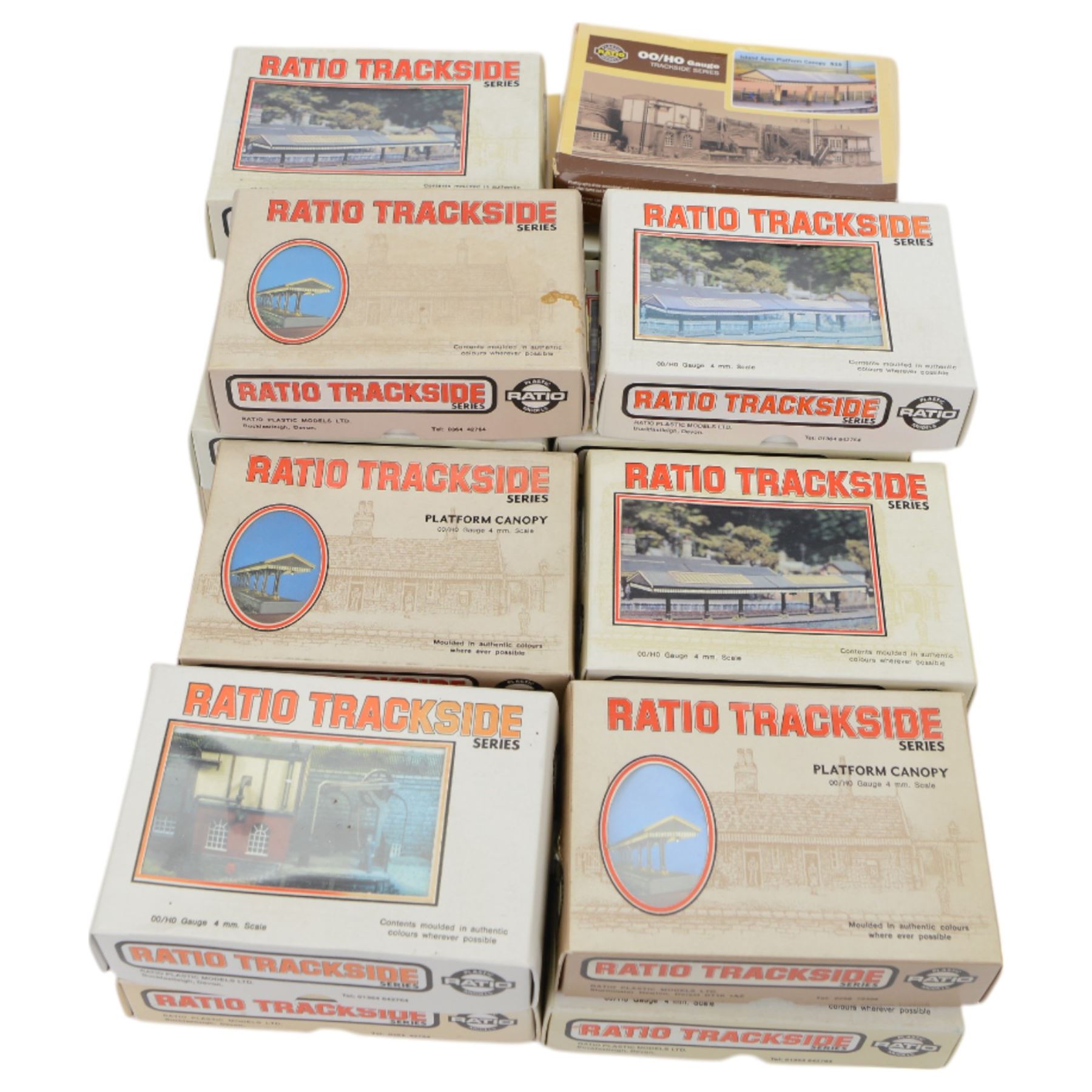 Twenty-two Ratio Trackside Series unbuilt 00 gauge model railway building kits, including two 522 Engine Sheds, thirteen 515 Platform Canopies, five 502 Cattle Docks, 540 Locomotive Servicing Depot and 529 Oil Depot, together with a collection of Ratio Trackside unbuilt accessory kits, including gutters, pipes, window arches, etc all boxed or carded
