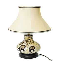 Moorcroft table lamp, decorated with butterflies on a cream ground, possibly a limited edi...