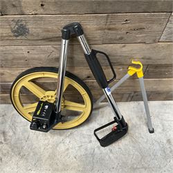Collection of surveyors equipment including an automatic level and tripod stand and Hilka Pro Craft distance measuring wheel