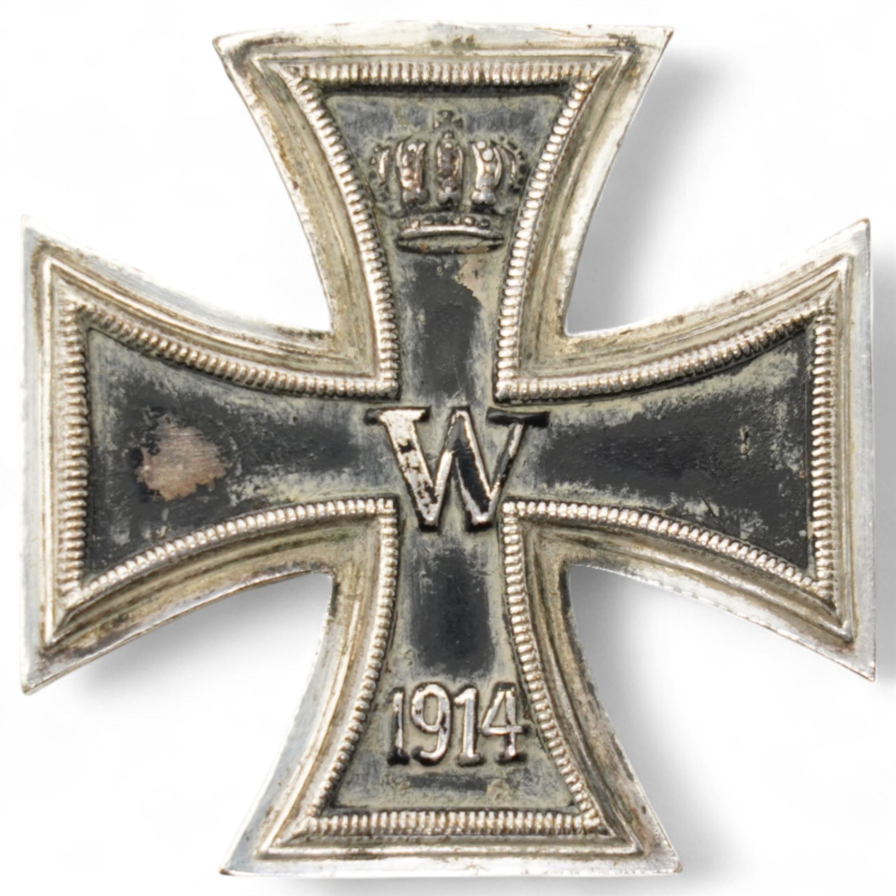 German Third Reich Krim shield arm badge 1941-1942, Auxiliary Cruiser badge and a WWI first class Iron Cross with field conversion (3) 