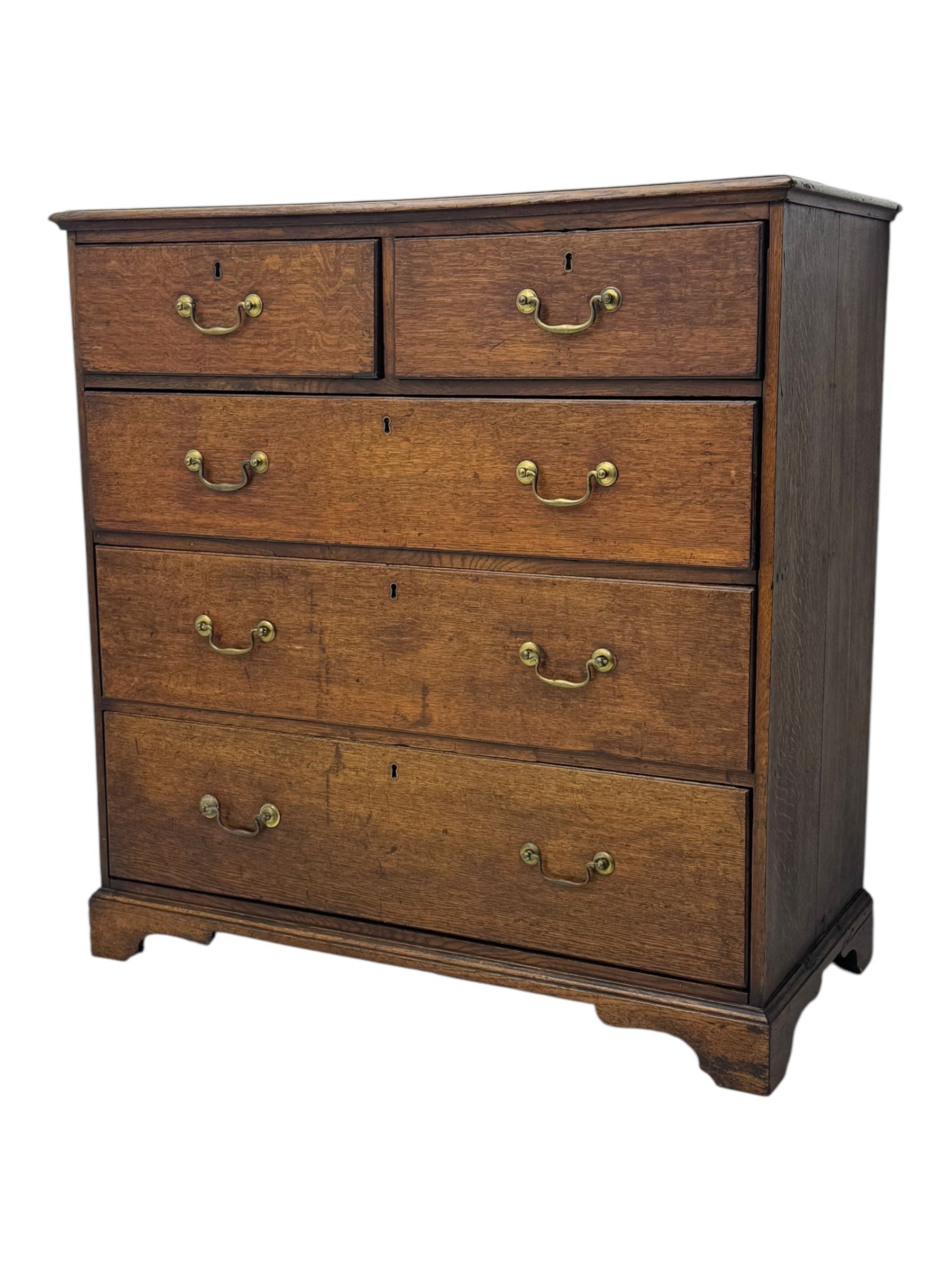 19th century oak chest, rectangular top over two short and three long drawers, on bracket feet