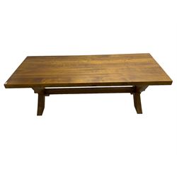 Oak rectangular extending dining table, raised on an X-frame base united by single stretcher, with two additional leaves