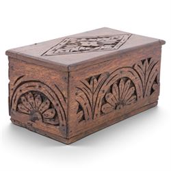 Carved oak box, the hinged lid with a carved diamond motif, the sides and front carved with stylised flowers, H12cm, L24cm