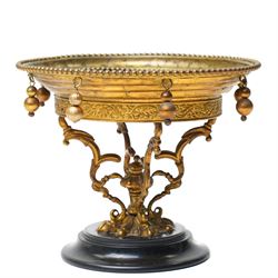 Italian Grand Tour pietra dura and ormolu tazza, the circular black stone top inlaid with a marble floral spray, within a beaded and foliate-cast ormolu rim hung with pendant spheres, on a scroll and acanthus-cast support and turned base, Florence, late 19th century, W15.5cm H12cm