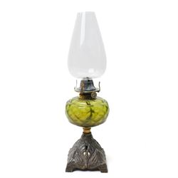 Late Victorian table oil lamp with green glass reservoir and metal base , cranberry glass oil lamp with loop handle and a pair of cranberry glass vases H30cm (4)
