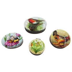 Group of four modern silver pill boxes, each of circular or oval form, with hand painted porcelain panel to cover depicting a robin upon a branch, a cockerel, a bee upon a pink flower, and yellow flowers, each signed JA, two examples hallmarked Hansford & Ainsworth, Birmingham 1995, the other two hallmarked C M E Jewellery Ltd, with Birmingham import mark, 925 quality control mark, and stamped 925, approximate gross weight 1.26 ozt (39.3 grams)
