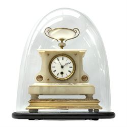 A 19th century French alabaster cased clock in a break front case with a flat top surmounted by an urn, with an eight-day Parisian timepiece movement, on a raised padded plinth under an associated glass dome with an ebonised base, enamel dial with roman numerals, minute markers and steel moon hands. With pendulum and key.





